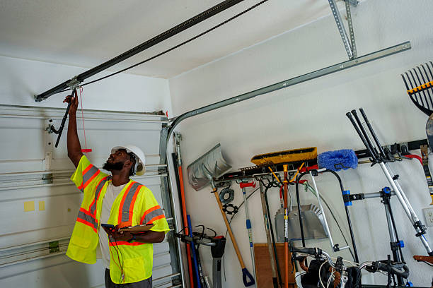 Professional Garage Door Panel Replacement technician working in Flower Hill, NY